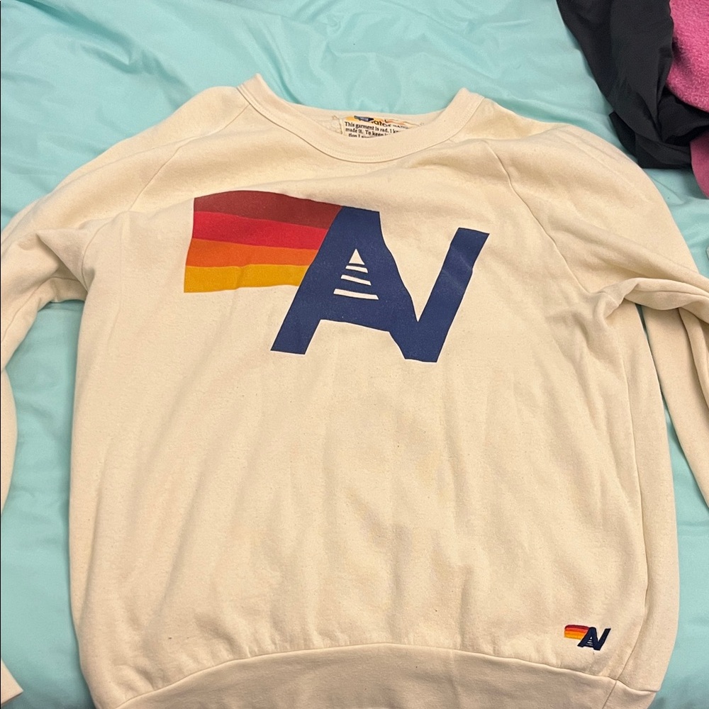 Aviator Nation Cream Sweater with Blue and Multicolor Design